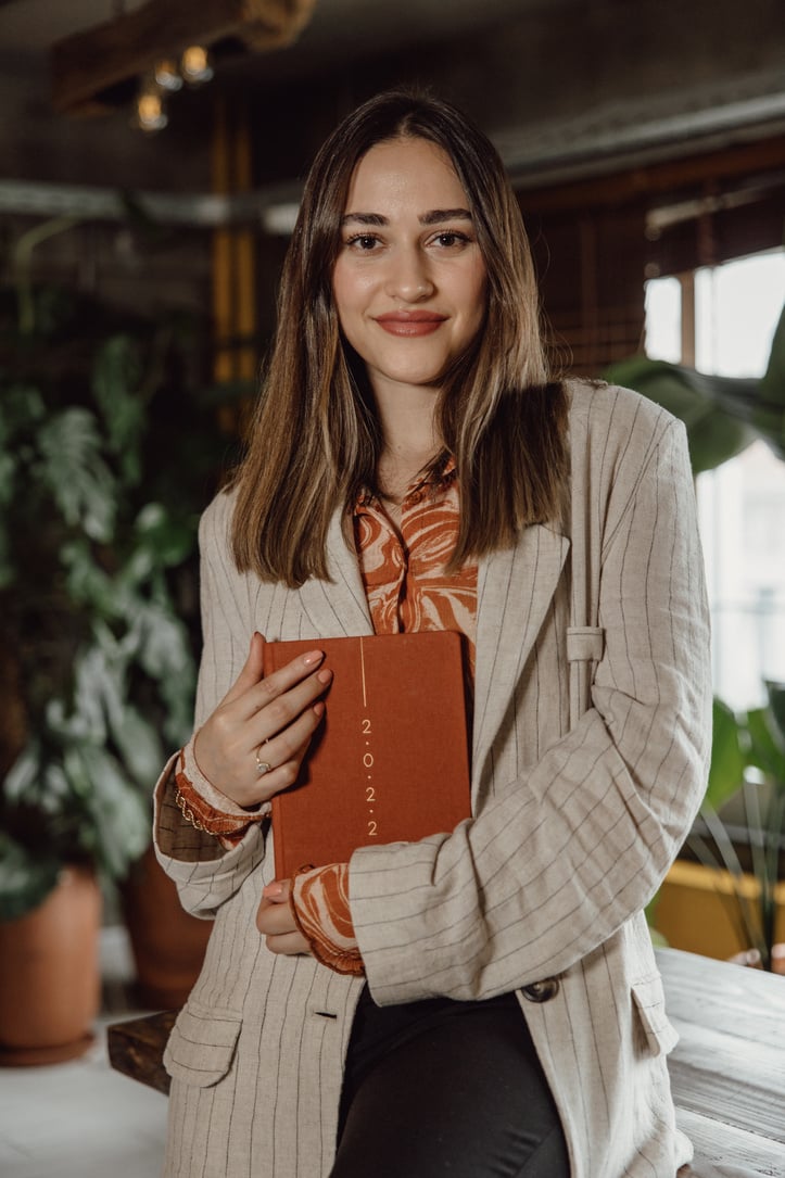 Woman with Planner in the Office